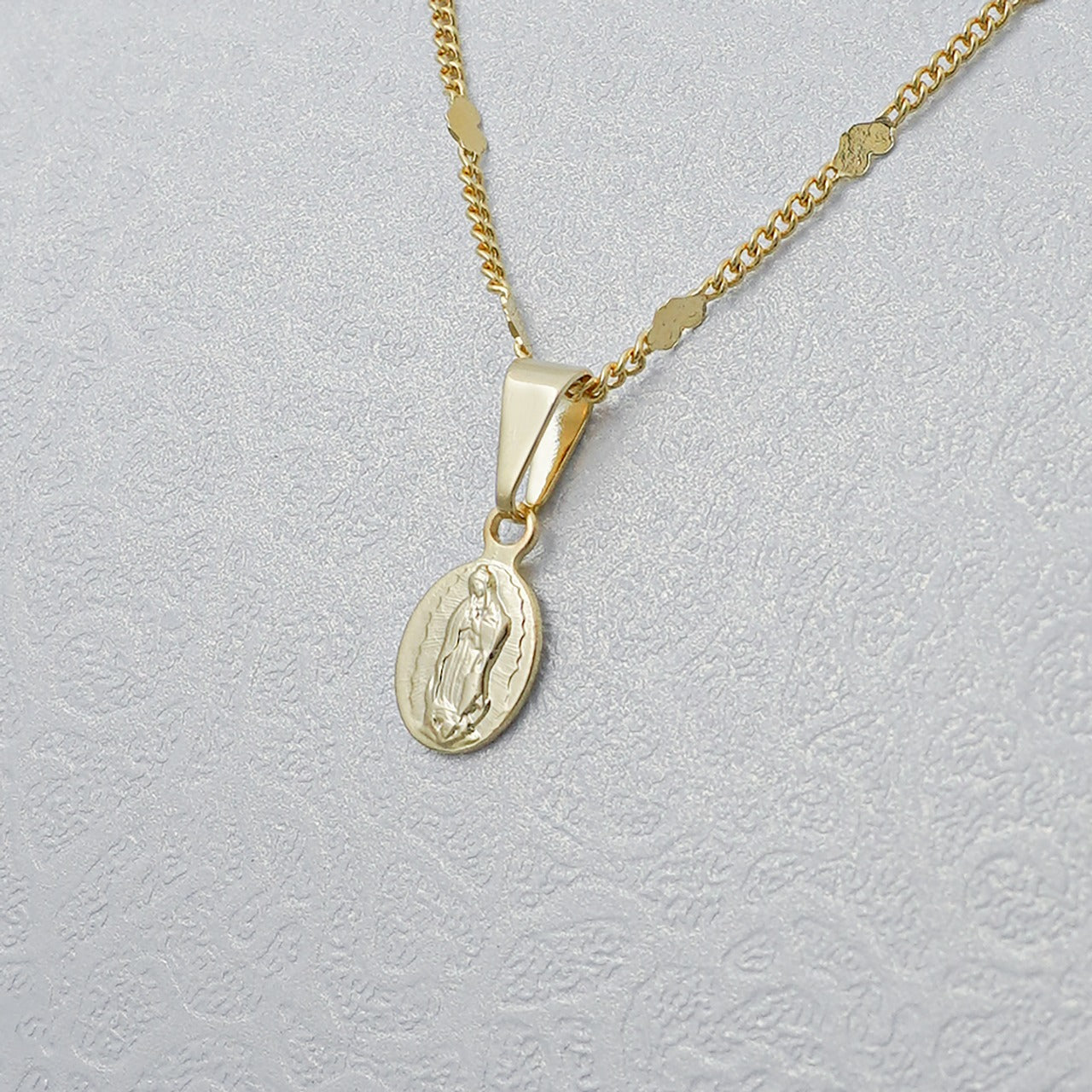 Dije laminado oro 18k Ref:23545